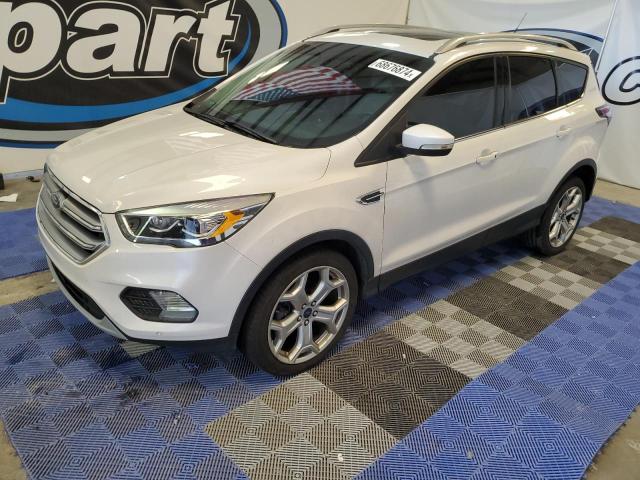 FORD ESCAPE TIT 2017 with VIN 1FMCU0J93HUB36248 - Photo from auction