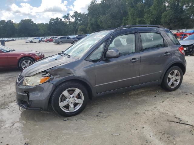 SUZUKI SX4 2012 with VIN JS2YB5A38C6307619 - Photo from auction