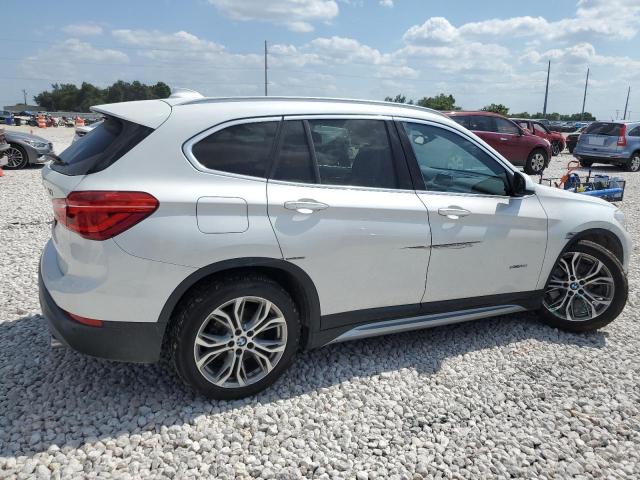 Photo 3 from auction – 2017 BMW X1 XDRIVE2 with VIN WBXHT3C3XH5F73543