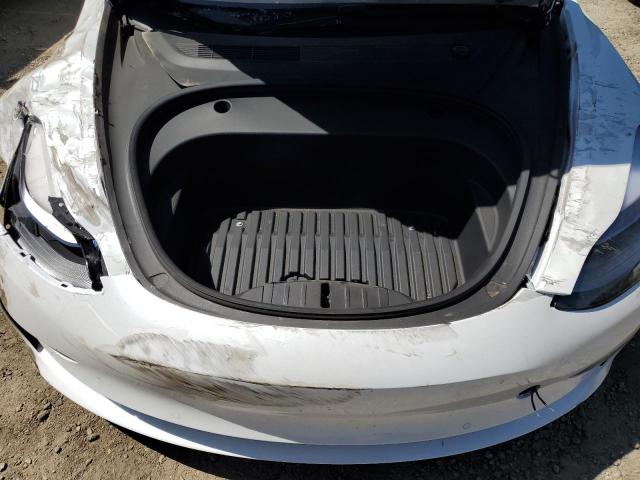 Photo 11 from auction – 2021 TESLA MODEL 3 with VIN 5YJ3E1EC3MF925581