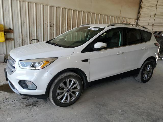 FORD ESCAPE TIT 2017 with VIN 1FMCU0J97HUB30663 - Photo from auction