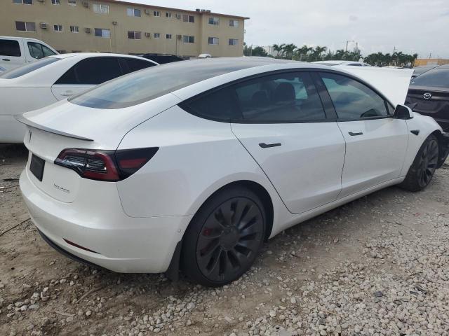 Photo 3 from auction – 2021 TESLA MODEL 3 with VIN 5YJ3E1ECXMF050287