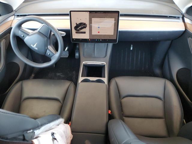Photo 8 from auction – 2023 TESLA MODEL Y with VIN 7SAYGAEE4PF832044