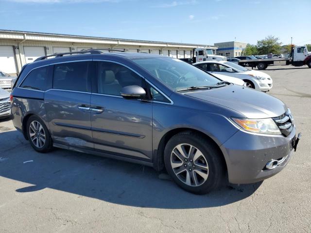 Photo 4 from auction – 2014 HONDA ODYSSEY TO with VIN 5FNRL5H94EB049693