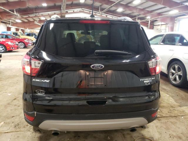 Photo 6 from auction – 2018 FORD ESCAPE TIT with VIN 1FMCU9J98JUA98476