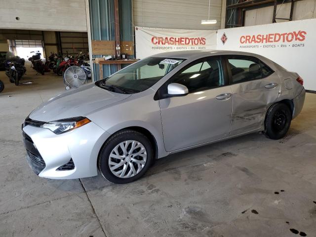 TOYOTA COROLLA L 2018 with VIN 5YFBURHE7JP748804 - Photo from auction