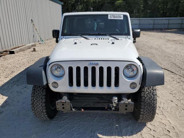 Photo 5 from auction – 2016 JEEP WRANGLER U with VIN 1C4BJWDG7GL179646