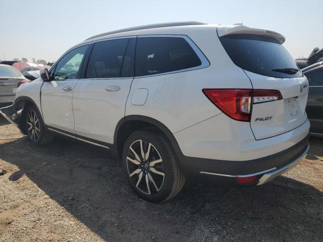 Photo 2 from auction – 2021 HONDA PILOT ELIT with VIN 5FNYF6H04MB049895