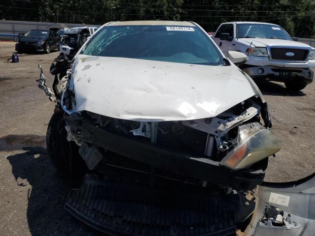 Photo 5 from auction – 2014 TOYOTA COROLLA L with VIN 5YFBURHE9EP099271