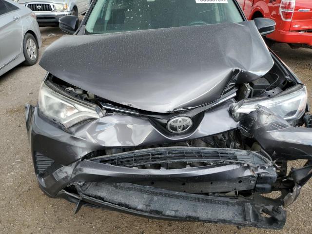 Photo 11 from auction – 2017 TOYOTA RAV4 LE with VIN JTMZFREV4HJ111493