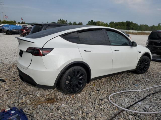 Photo 3 from auction – 2022 TESLA MODEL Y with VIN 7SAYGAEE0NF521885