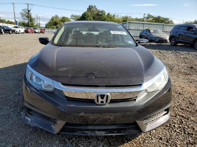 Photo 5 from auction – 2018 HONDA CIVIC LX with VIN 19XFC2F53JE207667