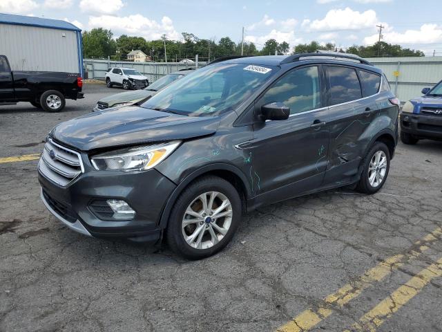 FORD ESCAPE SE 2018 with VIN 1FMCU0GD0JUB74974 - Photo from auction