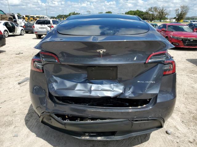 Photo 6 from auction – 2023 TESLA MODEL Y with VIN 7SAYGAEE6PF661104