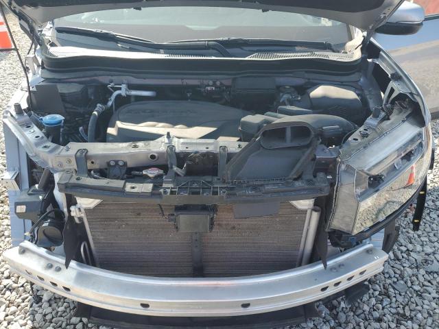 Photo 12 from auction – 2022 HONDA PASSPORT E with VIN 5FNYF8H55NB031947