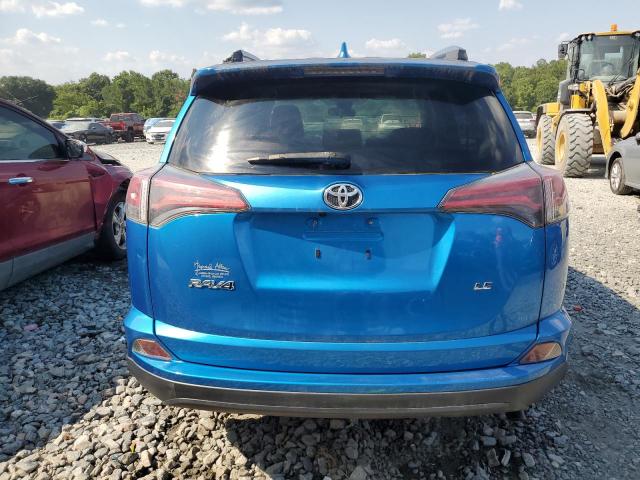 Photo 6 from auction – 2018 TOYOTA RAV4 LE with VIN JTMZFREV8JJ159407