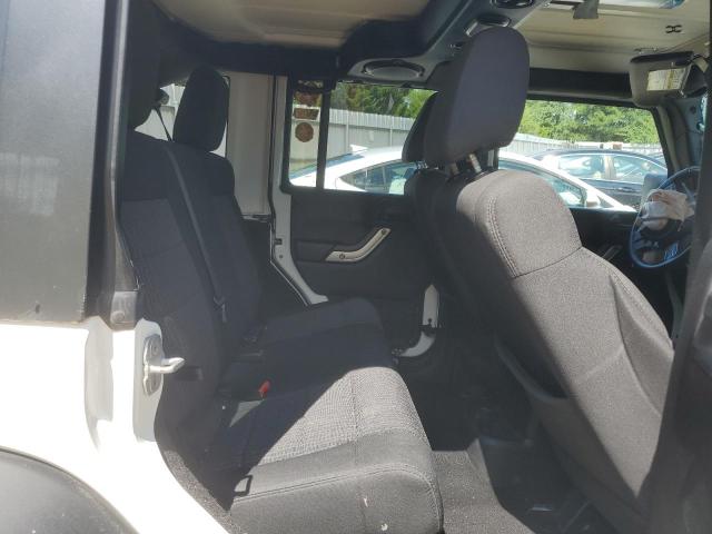 Photo 11 from auction – 2011 JEEP WRANGLER U with VIN 1J4BA6H18BL633749