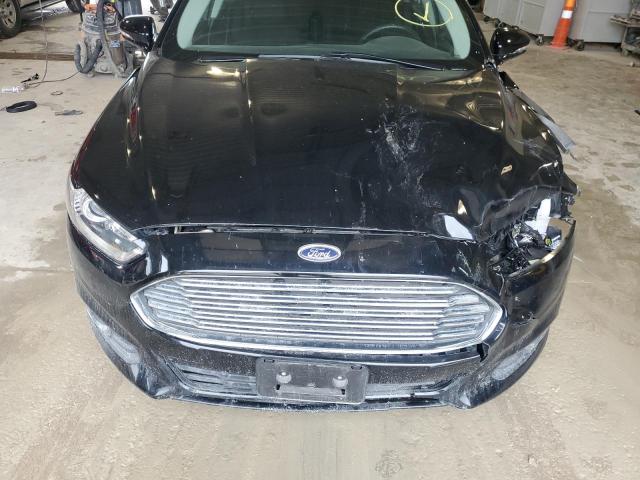 Photo 11 from auction – 2016 FORD FUSION SE with VIN 3FA6P0HD8GR390777