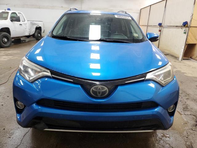 Photo 5 from auction – 2016 TOYOTA RAV4 LIMIT with VIN 2T3DFREV3GW482090
