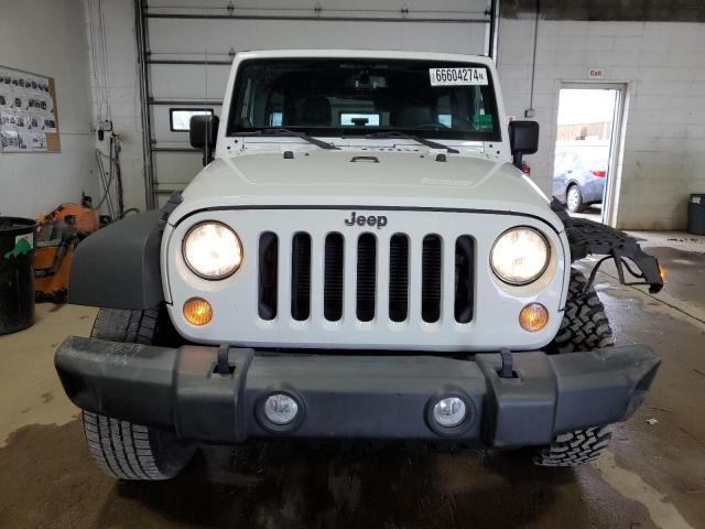 Photo 5 from auction – 2014 JEEP WRANGLER U with VIN 1C4HJWFGXEL115945