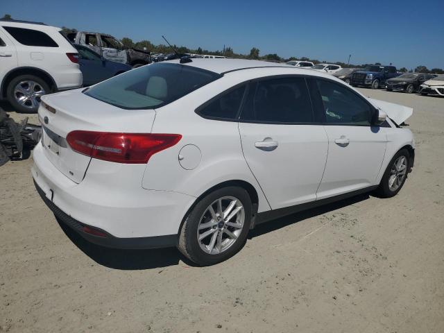 Photo 3 from auction – 2015 FORD FOCUS SE with VIN 1FADP3F24FL300807