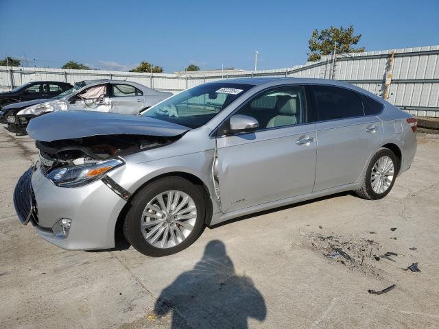 TOYOTA AVALON 2014 with VIN 4T1BD1EB1EU026437 - Photo from auction