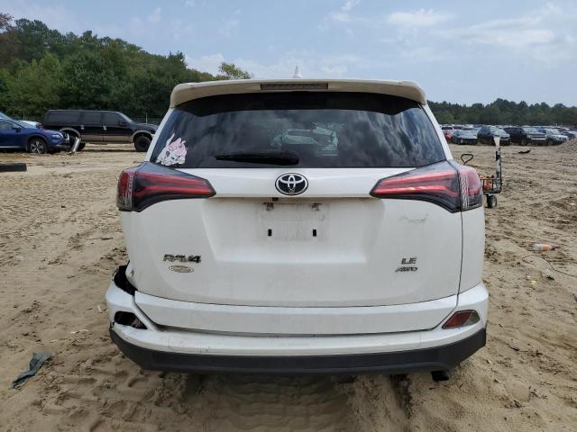 Photo 6 from auction – 2018 TOYOTA RAV4 LE with VIN JTMBFREV3JJ743831
