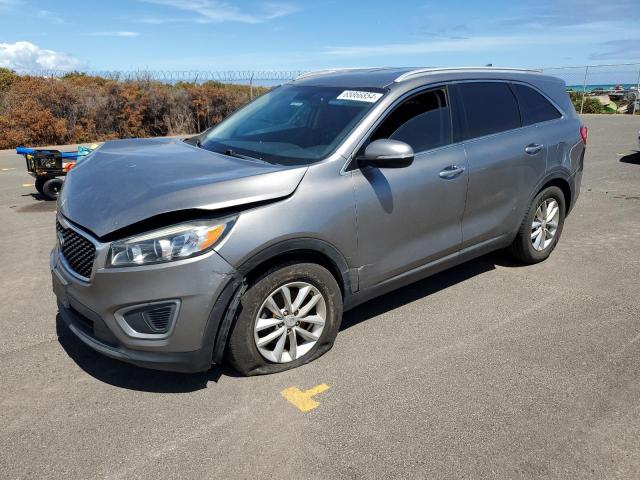 KIA SORENTO LX 2018 with VIN 5XYPG4A37JG375907 - Photo from auction