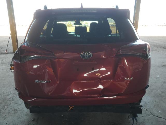 Photo 6 from auction – 2017 TOYOTA RAV4 XLE with VIN JTMWFREV0HJ116516