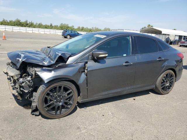 FORD FOCUS SE 2017 with VIN 1FADP3F22HL236138 - Photo from auction