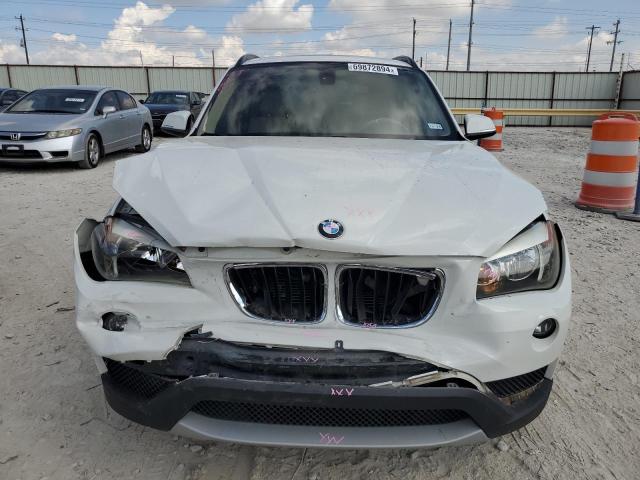 Photo 5 from auction – 2014 BMW X1 SDRIVE2 with VIN WBAVM1C55EVW51977