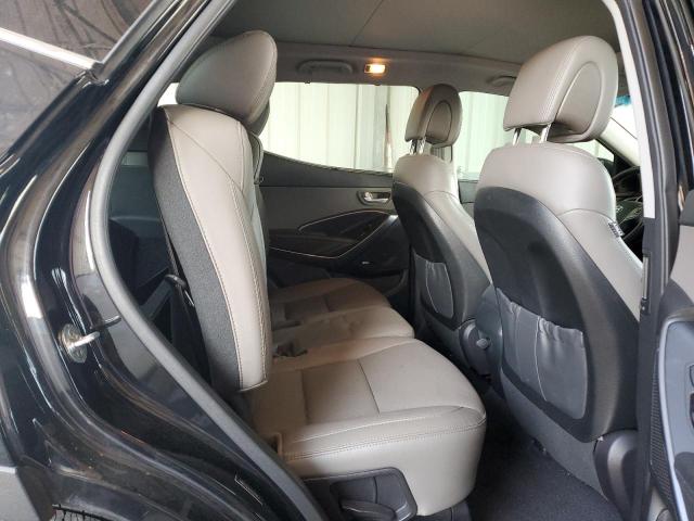 Photo 11 from auction – 2017 HYUNDAI SANTA FE S with VIN 5NMZU3LB0HH035952