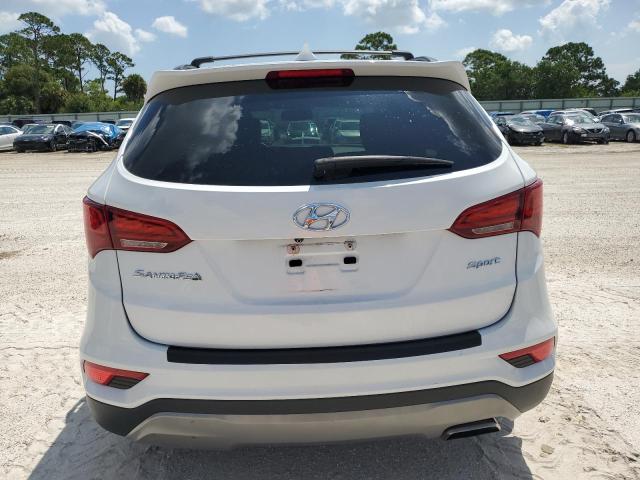 Photo 6 from auction – 2017 HYUNDAI SANTA FE S with VIN 5NMZU3LB4HH014280