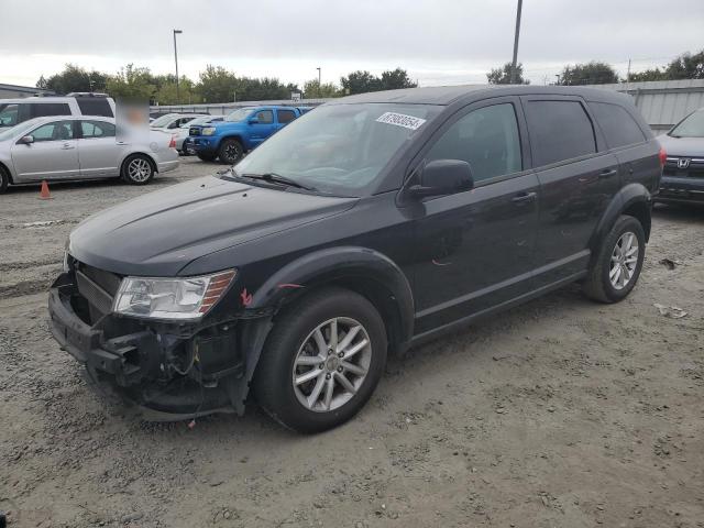 DODGE JOURNEY SX 2014 with VIN 3C4PDDBGXET230143 - Photo from auction