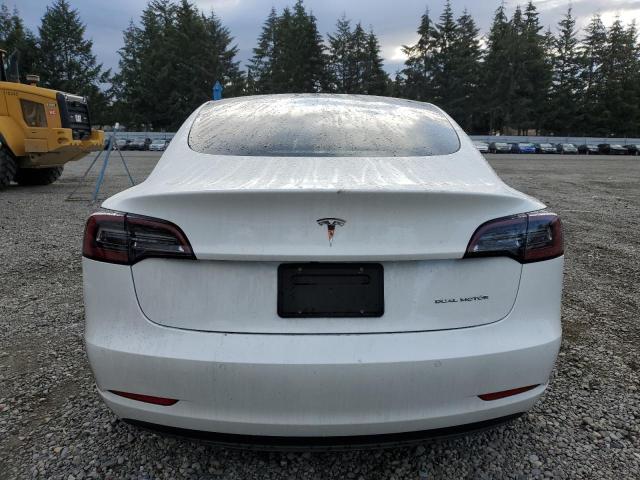 Photo 6 from auction – 2021 TESLA MODEL 3 with VIN 5YJ3E1EB7MF999027