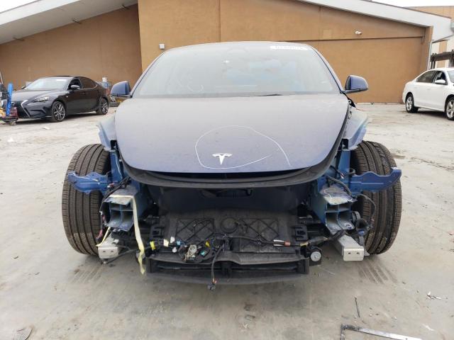 Photo 5 from auction – 2022 TESLA MODEL 3 with VIN 5YJ3E1EBXNF222343