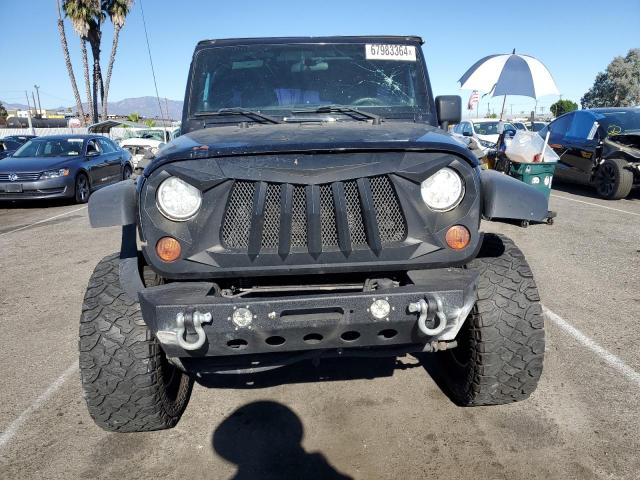 Photo 5 from auction – 2013 JEEP WRANGLER U with VIN 1C4BJWDG7DL520524