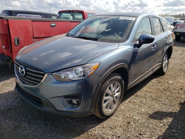 MAZDA CX-5 TOURI 2016 with VIN JM3KE4CY5G0661933 - Photo from auction