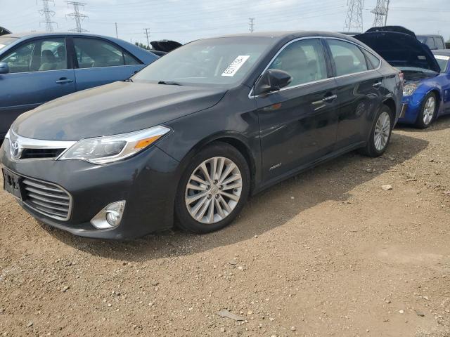TOYOTA AVALON HYB 2015 with VIN 4T1BD1EB8FU038750 - Photo from auction