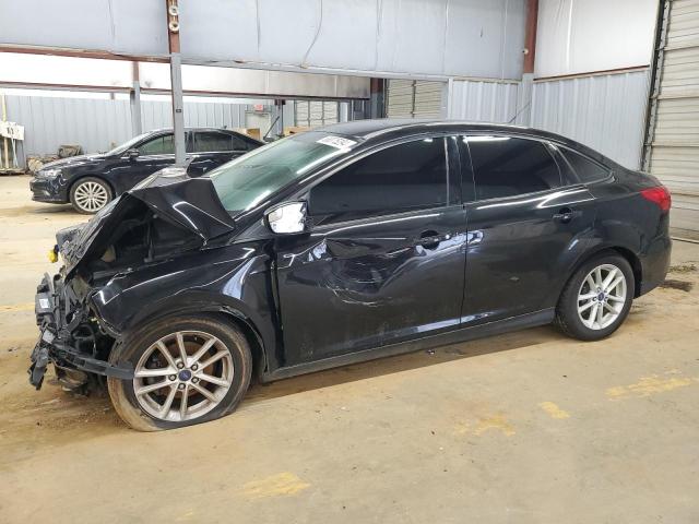 FORD FOCUS SE 2015 with VIN 1FADP3F20FL214023 - Photo from auction