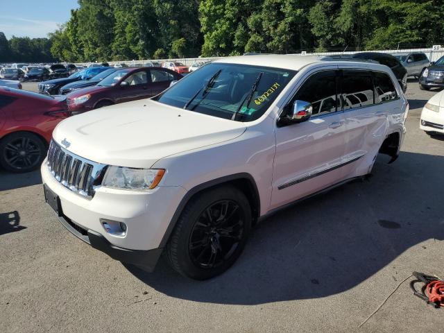 JEEP GRAND CHER 2011 with VIN 1J4RR4GG8BC670334 - Photo from auction