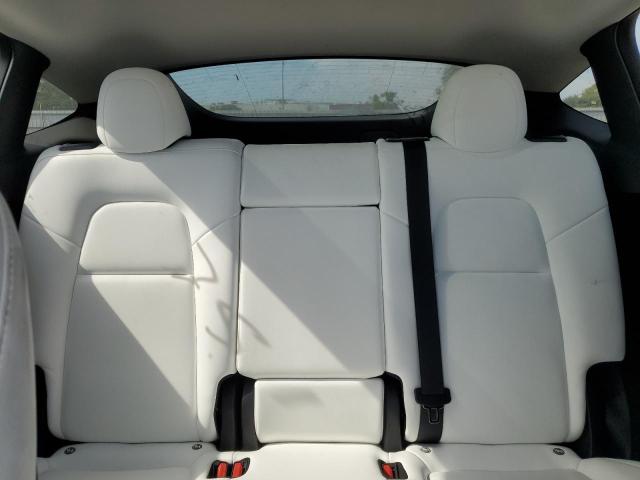 Photo 11 from auction – 2023 TESLA MODEL Y with VIN 7SAYGDEE1PF802386