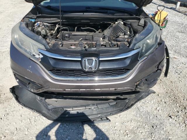 Photo 11 from auction – 2015 HONDA CR-V LX with VIN 5J6RM4H30FL072061
