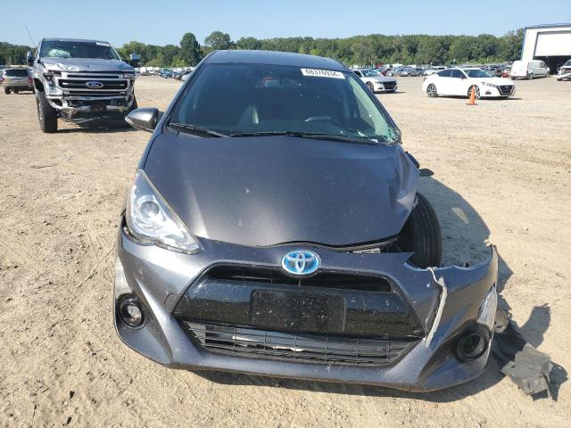Photo 5 from auction – 2015 TOYOTA PRIUS C with VIN JTDKDTB35F1090514