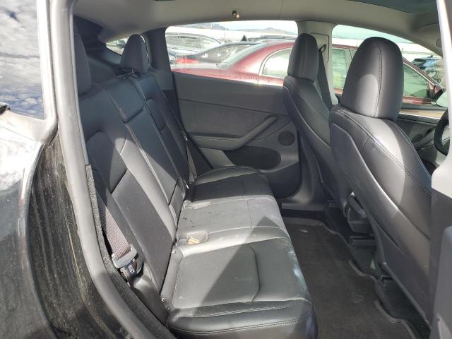 Photo 11 from auction – 2023 TESLA MODEL Y with VIN 7SAYGDEF6PF829303
