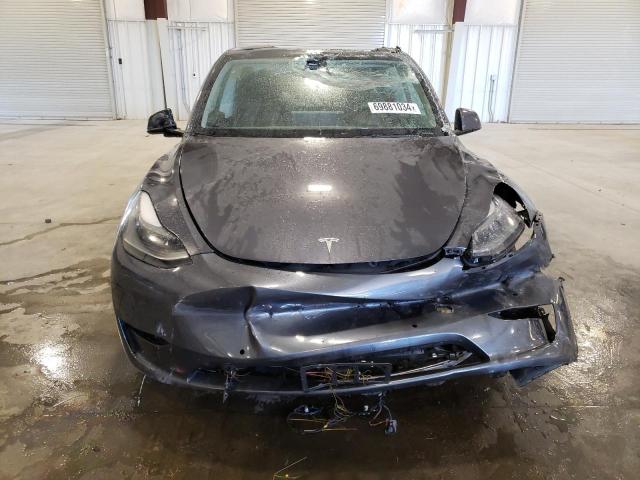 Photo 5 from auction – 2022 TESLA MODEL Y with VIN 7SAYGDEFXNF394167