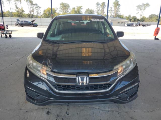 Photo 5 from auction – 2016 HONDA CR-V LX with VIN 5J6RM3H31GL023205