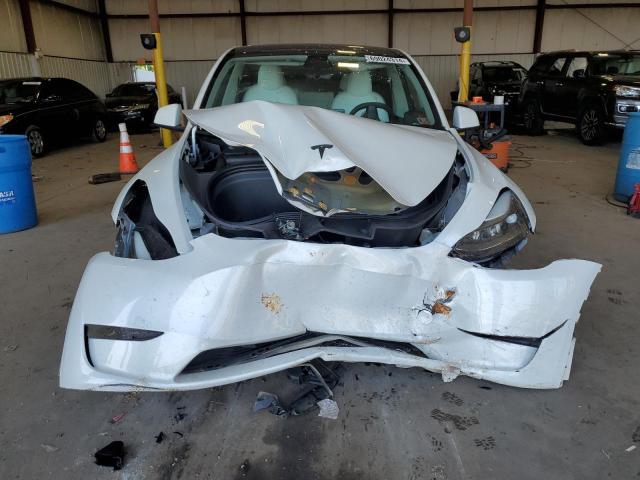 Photo 5 from auction – 2023 TESLA MODEL Y with VIN 7SAYGAEE3PF685621