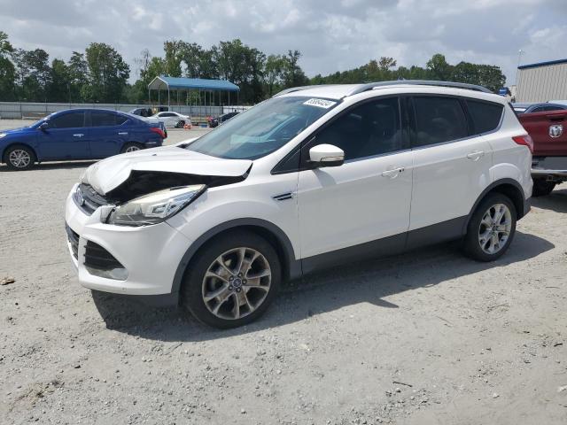 FORD ESCAPE TIT 2014 with VIN 1FMCU0JX1EUE34176 - Photo from auction