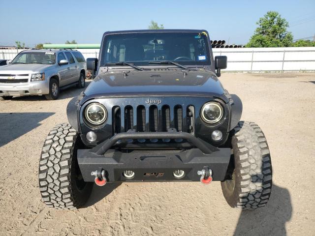 Photo 5 from auction – 2016 JEEP WRANGLER U with VIN 1C4BJWDG3GL213906